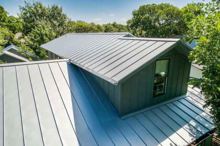 grey standing seam metal roof on Vista home